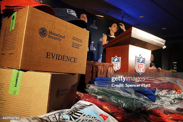 Confiscated counterfeit Super Bowl XLVIII merchandise is viewed at a news conference on the latest seizure of the merchandise leading up to the Super...