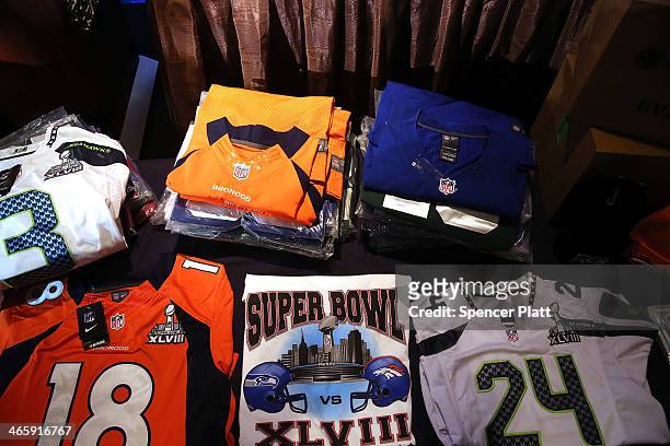 Confiscated counterfeit Super Bowl XLVIII merchandise is viewed at a news conference on the latest seizure of the merchandise leading up to the Super...