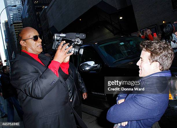 Stevie Wonder and Adam Glyn record an interview for TMZ after the "Late Show with David Letterman" at Ed Sullivan Theater on March 11, 2015 in New...