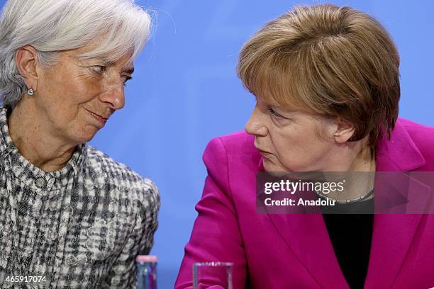 German Chancellor Angele Merkel and Managing Director of the International Monetary Fund Christine Lagarde attend a press conference after a meeting...