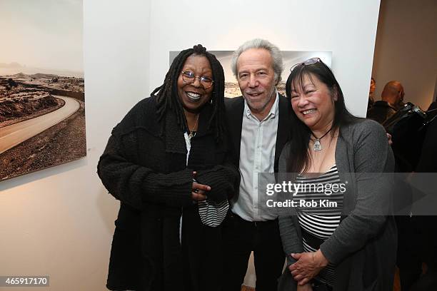 Whoopi Goldberg, Mark J. Plotkin and May Pang attend Julian Lennon's "Horizon" Exhibition Opening at Emmanuel Fremin Gallery on March 11, 2015 in New...