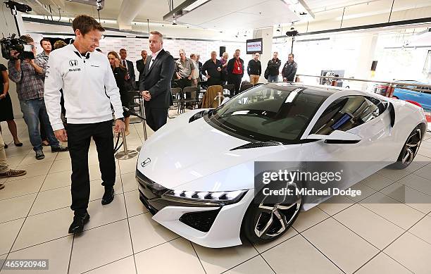 McLaren Honda F1 driver Jenson Button and Honda Australia Director Stephen Collins inspect the NSX concept vehicle at a Honda F1 Grand Prix press...