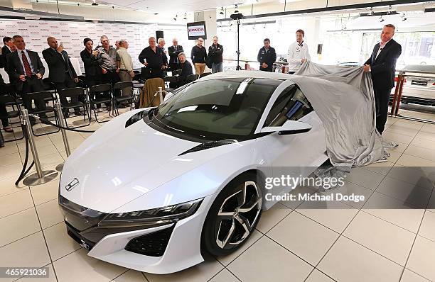 McLaren Honda F1 driver Jenson Button and Honda Australia Director Stephen Collins reveal the NSX concept vehicle at a Honda F1 Grand Prix press...