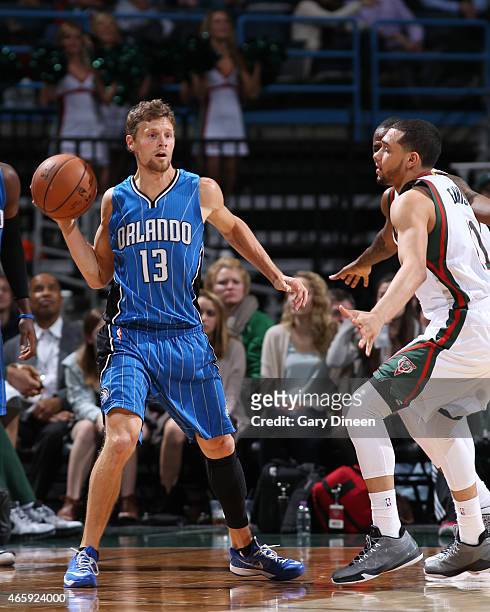 Luke Ridnour of the Orlando Magic moves the ball against the Milwaukee Bucks during the game on March 11, 2015 at BMO Harris Bradley Center in...
