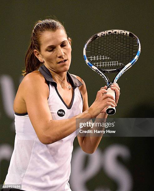 Chanelle Scheepers of South Africa reacts to a lost point in her match against Sloane Stephens during the BNP Parisbas Open at the Indian Wells...