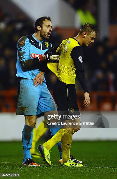 Manuel Almunia of Watford argues with Lars Joel Ekstrand during the Sky Bet Championship match between Nottingham Forest and Watford at City Ground...