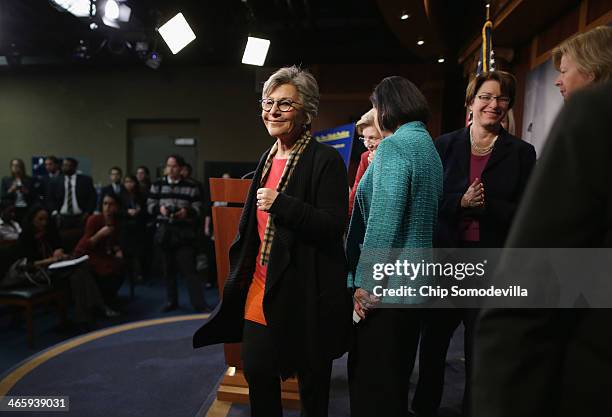 Sen. Barbara Boxer organized a group of women Democratic Senators for a news conference to announce their support for raising the minimum wage to...