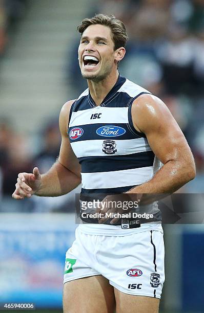 Tom Hawkins of the Cats celebrates a goal by Steven Motlop of the Cats during the NAB Challenge AFL match between the Geelong Cats and the Adelaide...