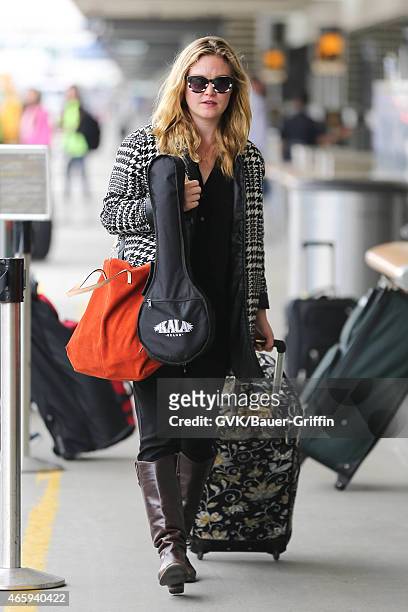 Julia Stiles seen at LAX on March 11, 2015 in Los Angeles, California.