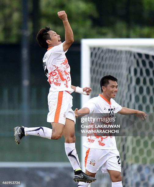 Bhutanese football players Kuenga Gyeltshen and Karan Gurung celebrate victory of the 2018 FIFA World Cup football qualifying match between Sri Lanka...