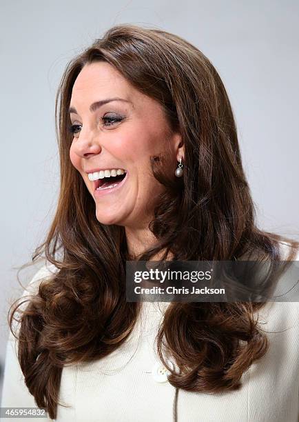 Catherine, Duchess of Cambridge smiles during an official visit to the set of Downton Abbey at Ealing Studios on March 12, 2015 in London, England.