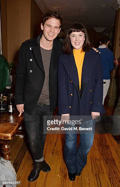 Jeremy Irvine and Alexandra Roach attend a drinks reception and private screening of BAFTA and Oscar nominated film "Philomena" hosted by Harvey...