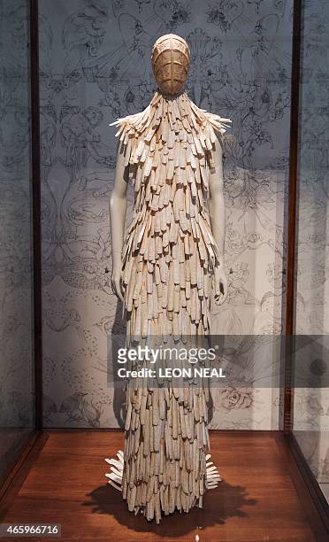 Razor clam shell encrusted dress from the "Voss" Spring/Summer 2001 collection is on display during a press preview of Alexander McQueen's "Savage...