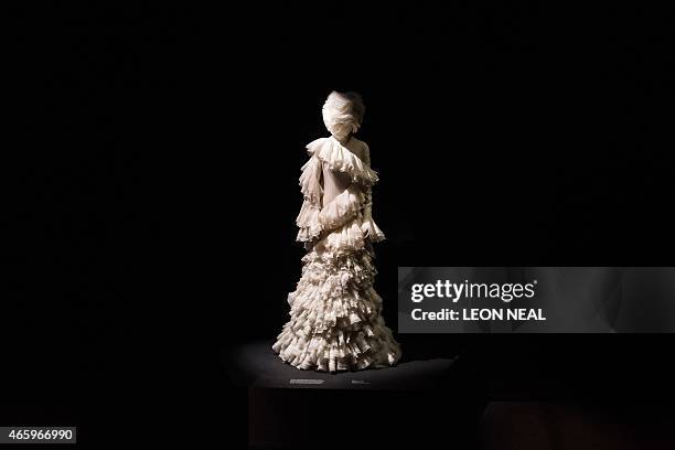 Silk dress from "The Widows of Culloden" Autumn / Winter 2006 collection is on display during a press preview of Alexander McQueen's "Savage Beauty"...