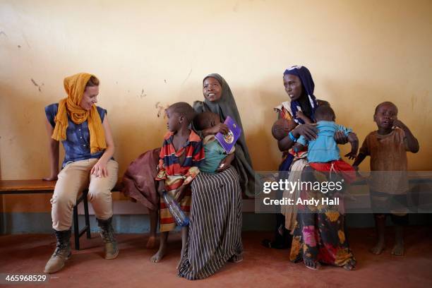 Oxfam ambassador Scarlett Johansson visits a reception centre for newly arrived refugees escaping from war and famine in neighbouring Somalia on...