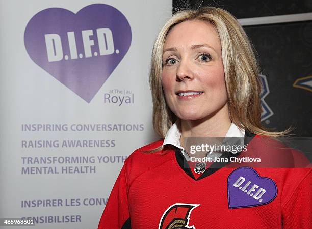 Stephanie Richardson poses for a photo on Hockey Talks night in support of Do It For Daron prior to an NHL game between the Tampa Bay Lightning and...