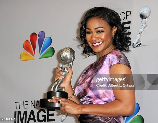 Actress Tatyana Ali poses inside the press room of the 44th NAACP Image Awards held at the Shrine Auditorium on February 1, 2013 in Los Angeles,...