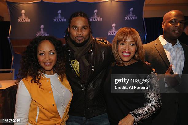 New York Jets Wide Receiver and NFL Players Choir member Josh Cribbs poses with Erica Campbell and Tina Campbell of the Gospel Duo Mary Mary at the...