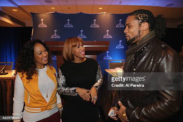 Erica Campbell and Tina Campbell of the Gospel Duo Mary Mary speak with New York Jets Wide Receiver and NFL Players Choir member Josh Cribbs at the...