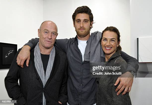 Actor Corbin Bernsen, Oliver Miller Bernsen, and actress Amanda Pays attend the Art Los Angeles Contemporary 2014 opening night at Barker Hangar on...