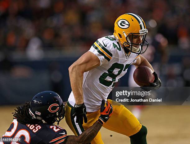 Jordy Nelson of the Green Bay Packers breaks away from Tim Jennings of the Chicago Bears at Soldier Field on December 29, 2013 in Chicago, Illinois.