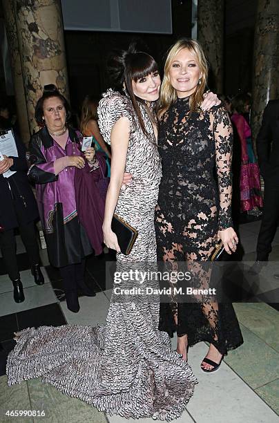 Annabelle Neilson and Kate Moss arrive at the Alexander McQueen: Savage Beauty Fashion Gala at the V&A, presented by American Express and Kering on...