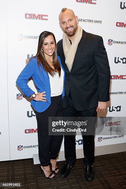 Danielle Conti and football player Mark Herzlich attend the 3rd Annual NFL Characters Unite at Sports Illustrated on January 30, 2014 in New York...