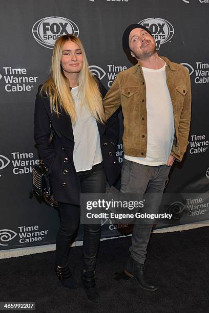 Lauren Parsekian and Aaron Paul attend Time Warner Cable Studios Presents FOX Sports 1 Thursday Night Super Bash on January 30, 2014 in New York City.