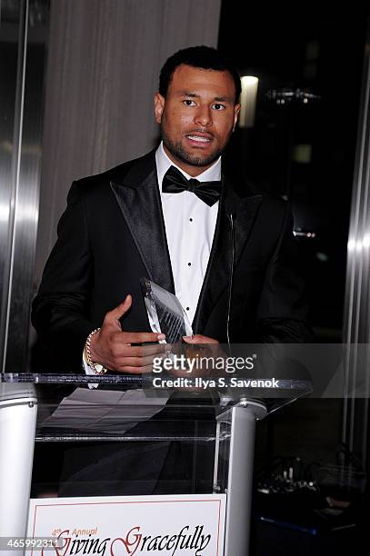 Football player Louis Murphy speaks onstage at 4th Annual Giving Gracefully Awards Super Bowl Edition 2014 at The Cube at Riverpark on January 30,...