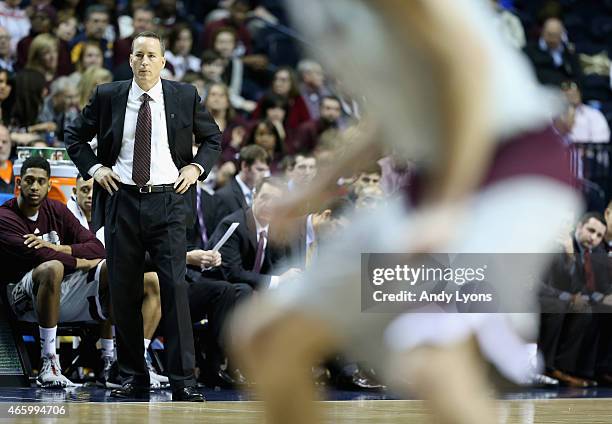 Billy Kennedy the head coach of the Texas A&M Aggies gives instructions to his team against the Auburn Tigers during the second round game of the SEC...