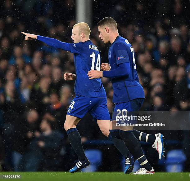 Steven Naismith of Everton celebrates with teammate Ross Barkley after scoring a goal to level the scores at 1-1 during the UEFA Europa League Round...