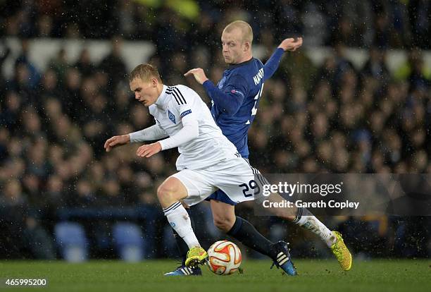 Vitaliy Buyalskyy of Dynamo Kyiv is tackled by Steven Naismith of Everton during the UEFA Europa League Round of 16, first leg match between Everton...