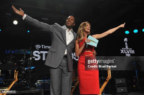 Personality Michael Strahan and FOX Sports broadcaster Erin Andrews speak at Time Warner Cable Studios Presents FOX Sports 1 Thursday Night Super...