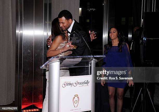 Chief consultant of Ombi Group Kimberly K. Haynes, football player Louis Murphy and Lauren McAlpin onstage at 4th Annual Giving Gracefully Awards...