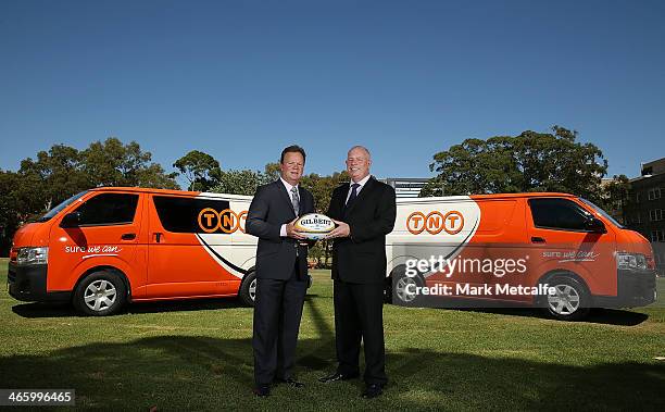 Bill Pulver and Bob Black of TNT pose during the TNT Sponsorship renewal announcement on January 31, 2014 in Sydney, Australia.