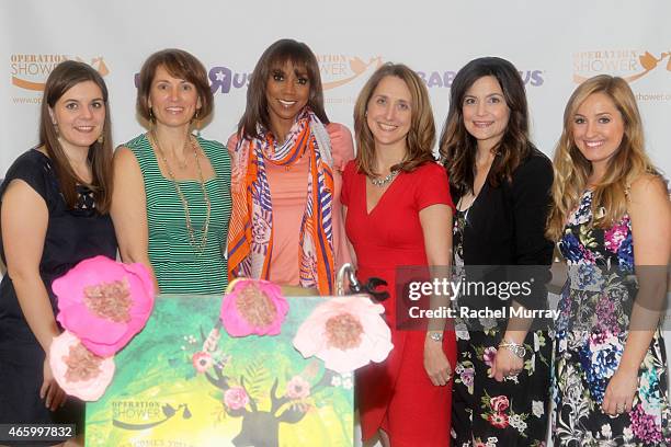 Lia Nunez, LeOra Fuhler, Holly Robinson Peete, LeAnn Morrissey, Amy Belle Isle and Jessica Feldhaus attend an Operation Shower event hosted by Holly...