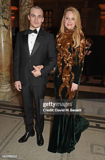 Rupert Friend and Aimee Mullins attend the Alexander McQueen: Savage Beauty Fashion Gala at the V&A, presented by American Express and Kering on...