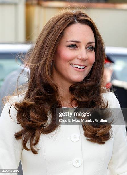 Catherine, Duchess of Cambridge visits the set of "Downton Abbey" at Ealing Studios on March 12, 2015 in London, England.