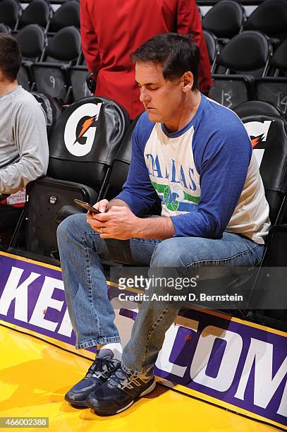 Mark Cuban owner of the Dallas Mavericks sits on the sideline before a game against the Los Angeles Lakers at STAPLES Center on March 8, 2015 in Los...