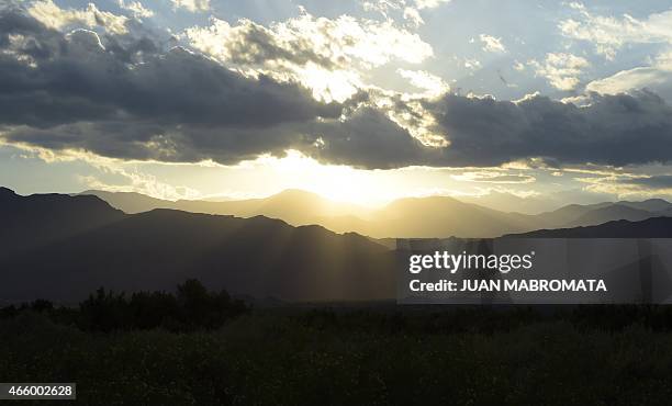 Sunset at Villa Union, in the Argentine province of La Rioja, on March 12, 2015. AFP PHOTO / JUAN MABROMATA