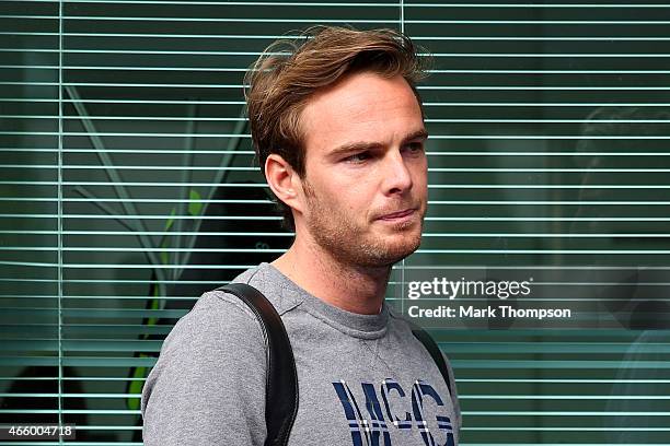 Giedo van der Garde of Netherlands and Sauber F1 waits outside the paddock before practice for the Australian Formula One Grand Prix at Albert Park...