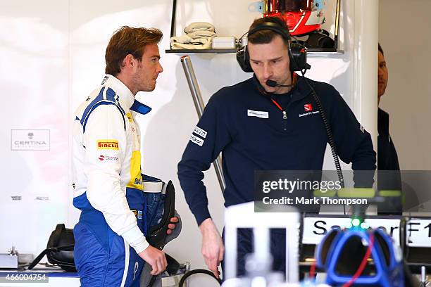 Giedo van der Garde of Netherlands and Sauber F1 walks through the team garage during practice for the Australian Formula One Grand Prix at Albert...