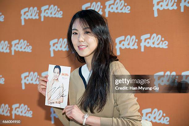 South Korean actress Kim Min-Hee attends the autograph session for Folli Follie at Lotte Department Store on March 12, 2015 in Seoul, South Korea.