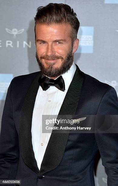 David Beckham attends a private view for the "Alexander McQueen: Savage Beauty" exhibition at Victoria & Albert Museum on March 12, 2015 in London,...