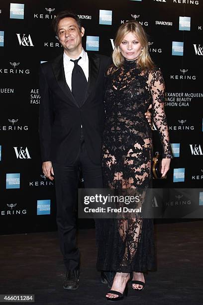 Jamie Hince and Kate Moss attends a private view for the "Alexander McQueen: Savage Beauty" exhibition at Victoria & Albert Museum on March 12, 2015...