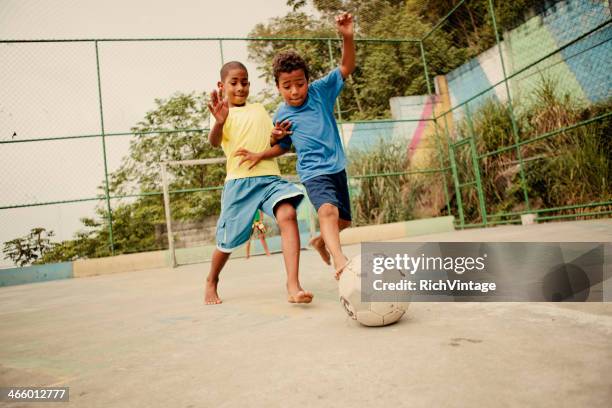 brazilian soccer - poor kids playing soccer stock pictures, royalty-free photos & images