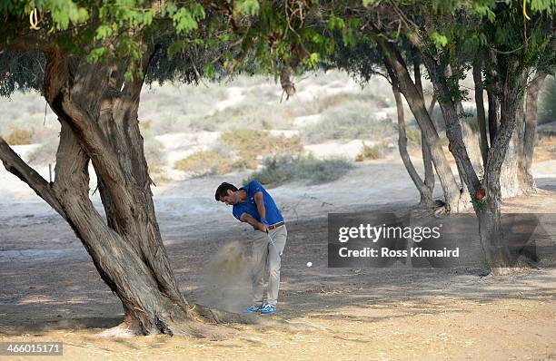 Robert Rock of England plays his second shot on the par five 3rd hole during the second round of the Omega Dubai Desert Classic on the Majlis Course...