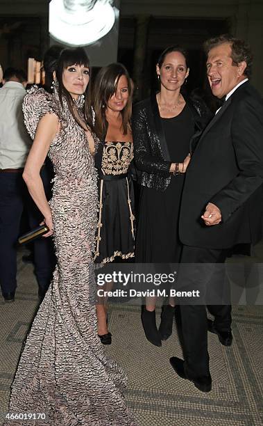 Annabelle Neilson, Jade Jagger, Rosemary Ferguson and Mario Testino attend the Alexander McQueen: Savage Beauty Fashion Gala at the V&A, presented by...