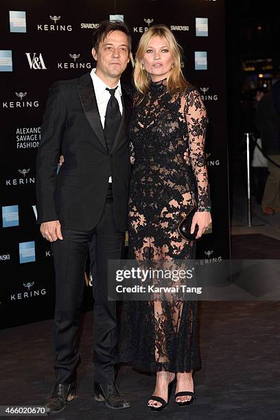 Jamie Hince and Kate Moss attend a private view for the "Alexander McQueen: Savage Beauty" exhibition at Victoria & Albert Museum on March 12, 2015...