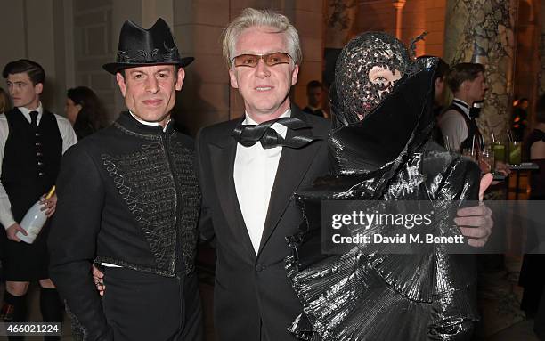 Stefan Bartlett, Philip Treacy and Harriet Verney attend the Alexander McQueen: Savage Beauty Fashion Gala at the V&A, presented by American Express...